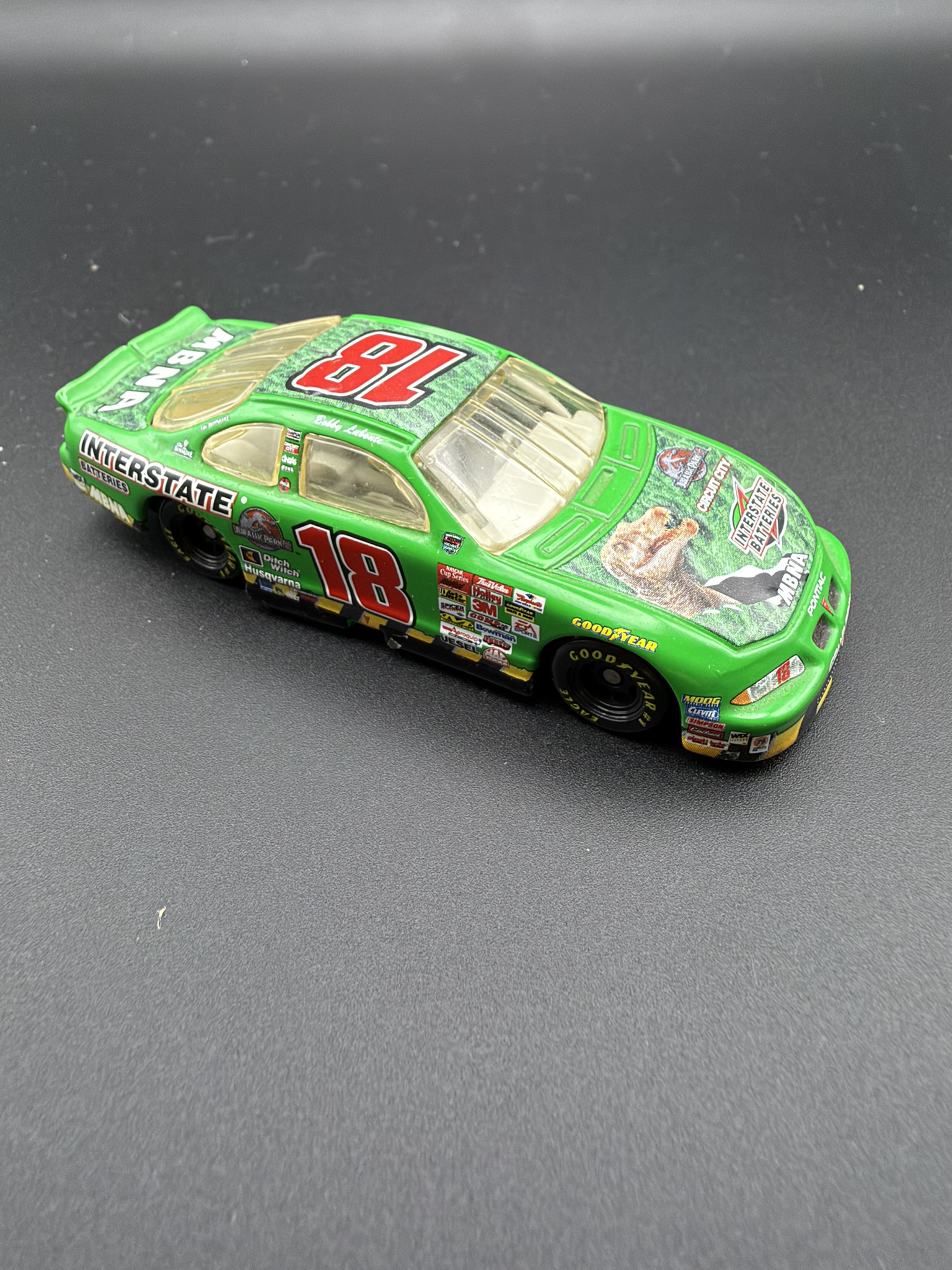Bobby Labonte #18 Interstate Batteries NASCAR Diecast Car Jurassic Park